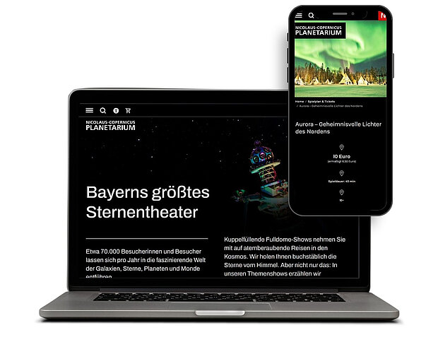 Laptop und Handy mit offener Planetarium-Webseite
